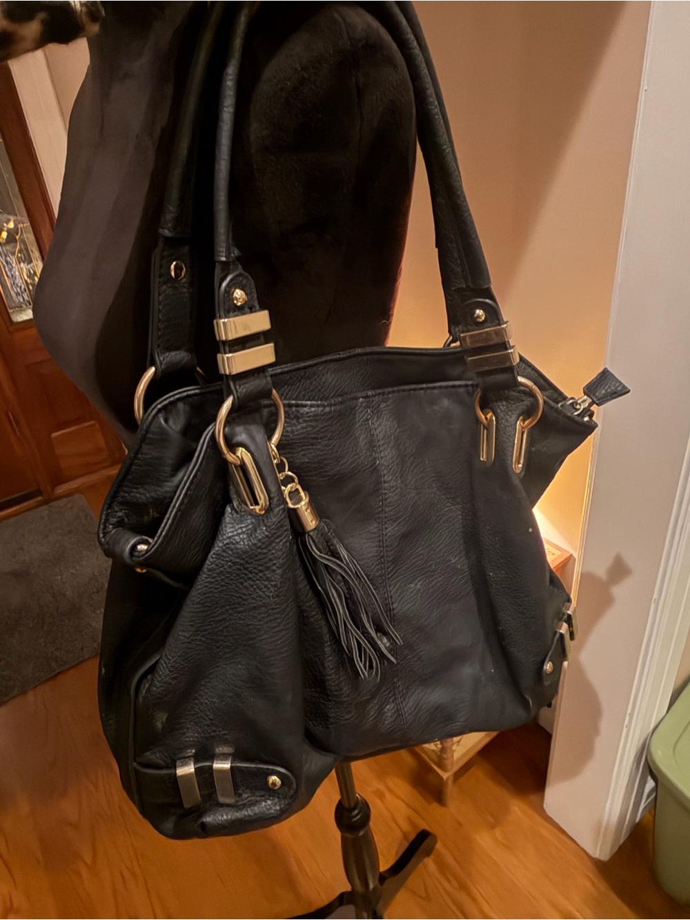 NYC Black Leather Shoulder Bag with Gold Hardware and Tassel